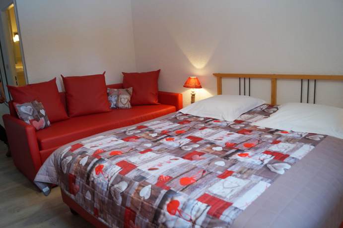 Imagen de la habitación del Hotel Le Blanchon. Foto 16