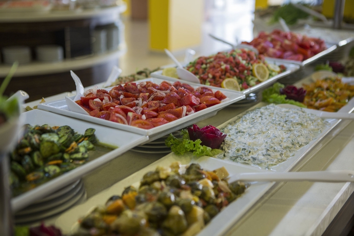 Imagen del bar/restaurante del Hotel Le Bleu and Resort. Foto 3