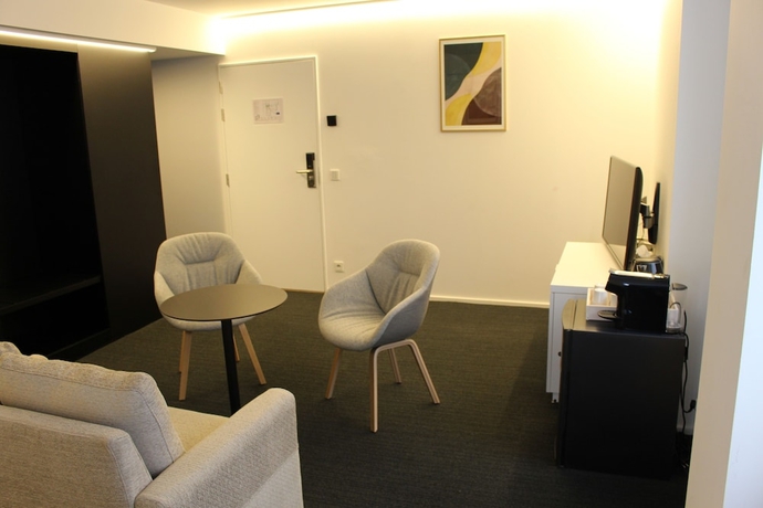 Imagen de la habitación del Hotel Le Bois De Bruges. Foto 5