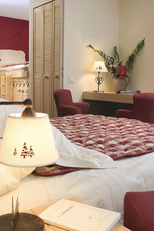 Imagen de la habitación del Hotel Le Bois Joli. Foto 6