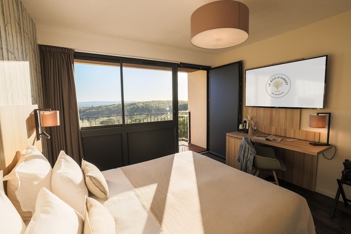 Imagen de la habitación del Hotel Le Bois d\'Imbert. Foto 9
