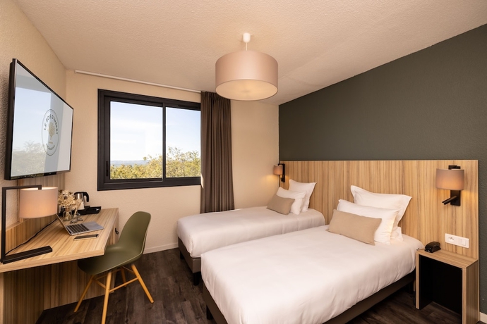 Imagen de la habitación del Hotel Le Bois d\'Imbert. Foto 11
