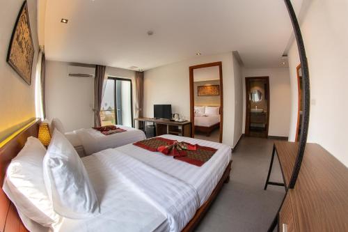 Imagen de la habitación del Hotel Le Botum. Foto 5