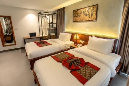 Imagen de la habitación del Hotel Le Botum. Foto 6