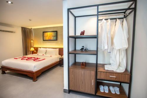 Imagen de la habitación del Hotel Le Botum. Foto 7