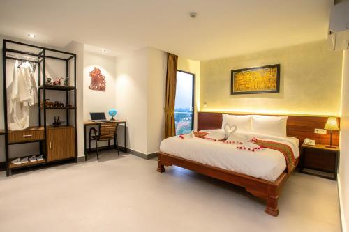 Imagen de la habitación del Hotel Le Botum. Foto 8