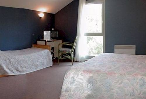 Imagen de la habitación del Hotel Le Bout Du Monde. Foto 11
