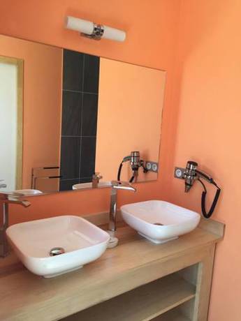 Imagen de la habitación del Hotel Le Bout Du Monde. Foto 16