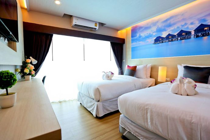 Imagen de la habitación del Hotel Le Breeze Resort. Foto 10