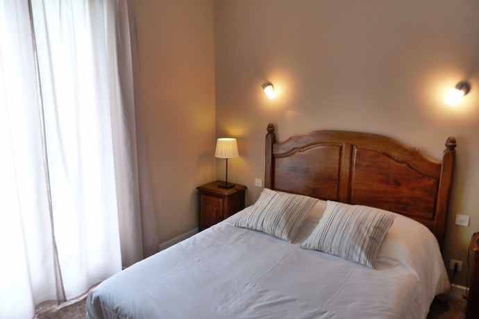 Imagen de la habitación del Hotel Le Brunet. Foto 9