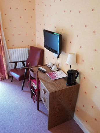 Imagen de la habitación del Hotel Le Brunet. Foto 10