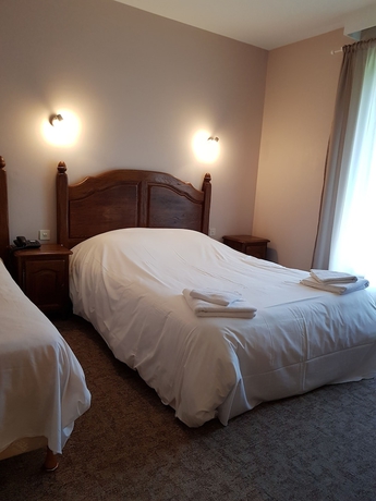 Imagen de la habitación del Hotel Le Brunet. Foto 13
