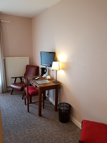 Imagen de la habitación del Hotel Le Brunet. Foto 14
