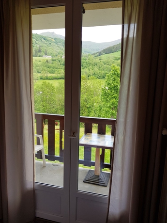 Imagen de la habitación del Hotel Le Brunet. Foto 15