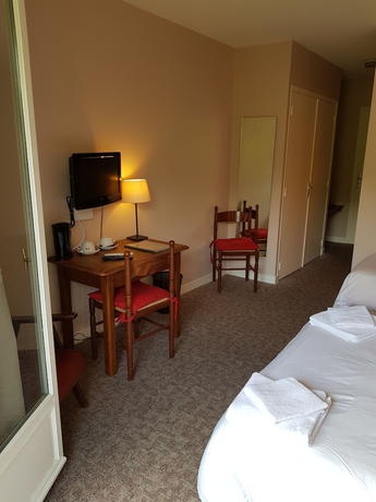 Imagen de la habitación del Hotel Le Brunet. Foto 16
