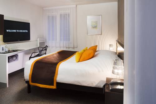 Imagen de la habitación del Hotel Le Bugatti. Foto 4