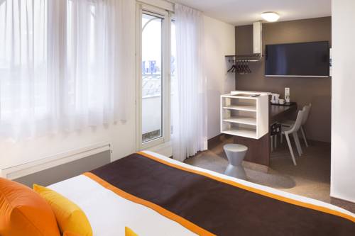 Imagen de la habitación del Hotel Le Bugatti. Foto 5