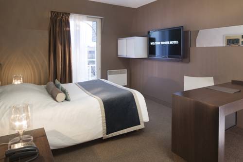 Imagen de la habitación del Hotel Le Bugatti. Foto 6