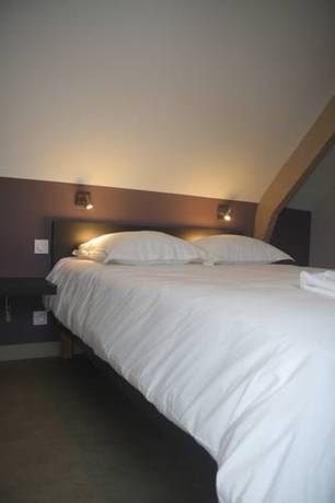 Imagen de la habitación del Hotel Le Cadoudal. Foto 5