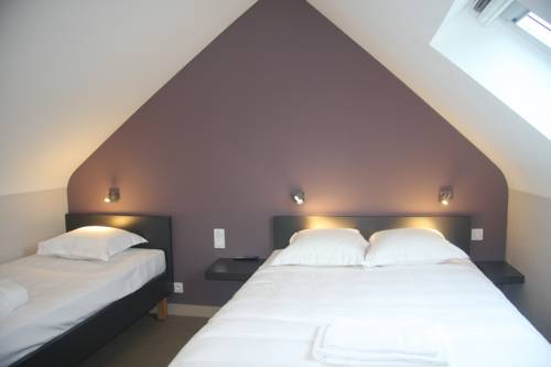 Imagen de la habitación del Hotel Le Cadoudal. Foto 9