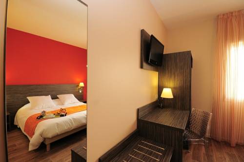 Imagen de la habitación del Hotel Le Ca&iuml;man. Foto 14