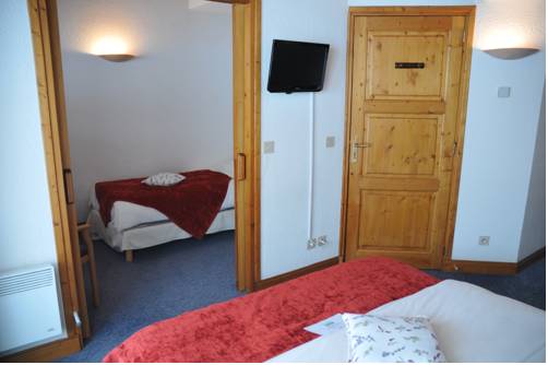 Imagen de la habitación del Hotel Le Calgary. Foto 3