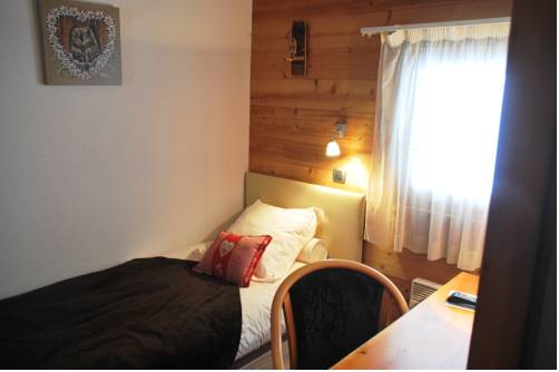 Imagen de la habitación del Hotel Le Calgary. Foto 4