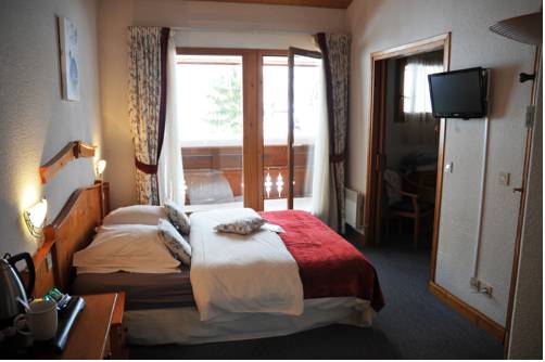 Imagen de la habitación del Hotel Le Calgary. Foto 13