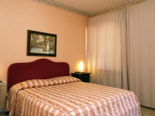 Imagen de la habitación del Hotel Le Calle. Foto 7