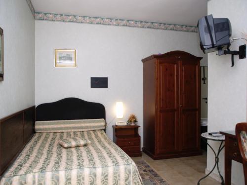 Imagen de la habitación del Hotel Le Calle. Foto 8