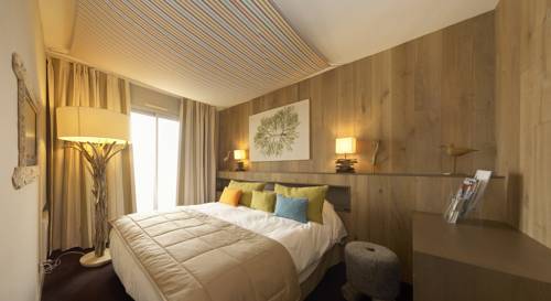 Imagen de la habitación del Hotel Le Calluna. Foto 12