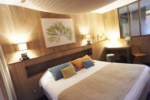 Imagen de la habitación del Hotel Le Calluna. Foto 14