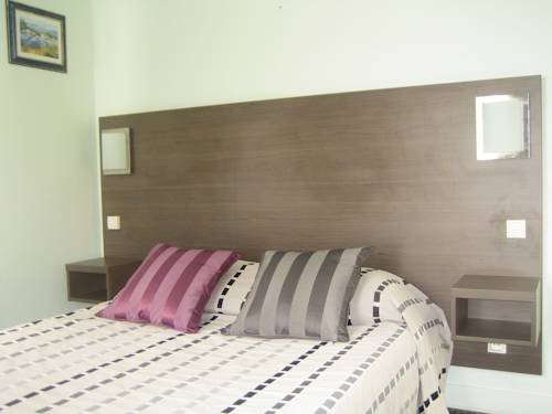 Imagen de la habitación del Hotel Le Canada. Foto 12