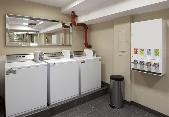 Imagen de la habitación del Hotel Le Cantlie Suites. Foto 13