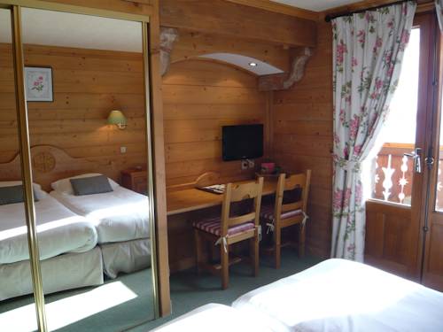 Imagen de la habitación del Hotel Le Caprice Des Neiges. Foto 4