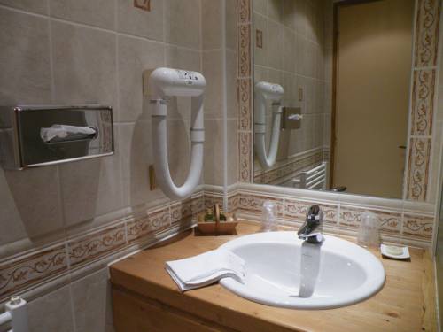 Imagen de la habitación del Hotel Le Caprice Des Neiges. Foto 10