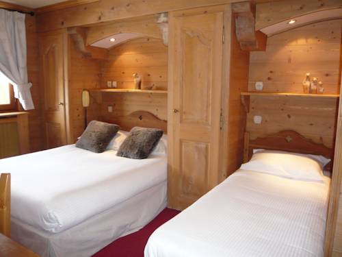 Imagen de la habitación del Hotel Le Caprice Des Neiges. Foto 12