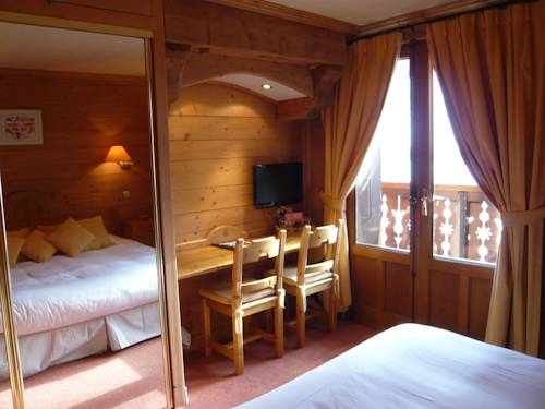 Imagen de la habitación del Hotel Le Caprice Des Neiges. Foto 15