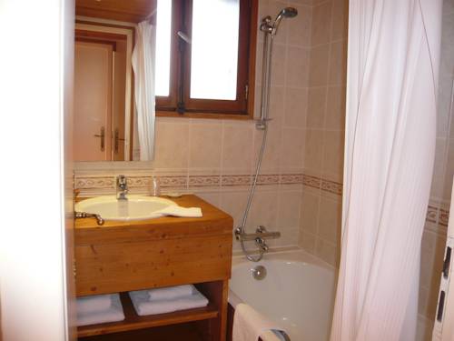 Imagen de la habitación del Hotel Le Caprice Des Neiges. Foto 16