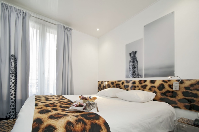 Imagen de la habitación del Hotel Le Cardinal Rueil Centre. Foto 10