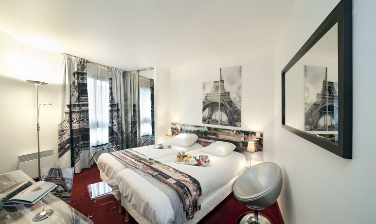 Imagen de la habitación del Hotel Le Cardinal Rueil Centre. Foto 13