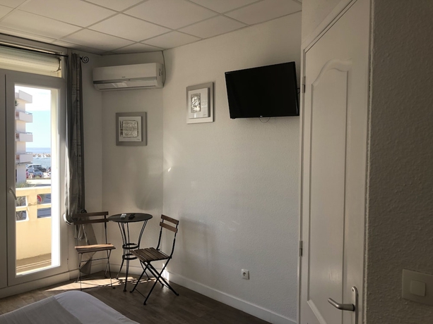 Imagen de la habitación del Hotel Le Carnon. Foto 5