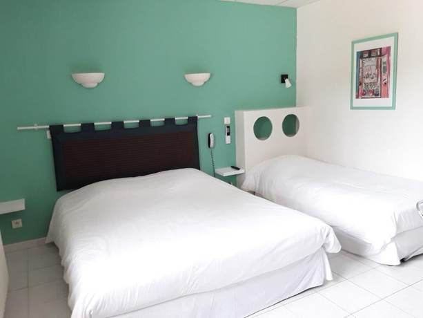 Imagen de la habitación del Hotel Le Carry H&ocirc;tel. Foto 5