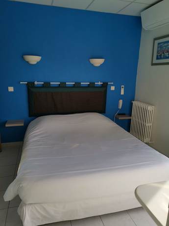 Imagen de la habitación del Hotel Le Carry H&ocirc;tel. Foto 6