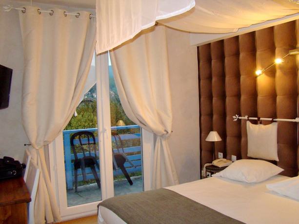 Imagen de la habitación del Hotel Le Castel Fleuri, Saint-Jean-en-Royans. Foto 4