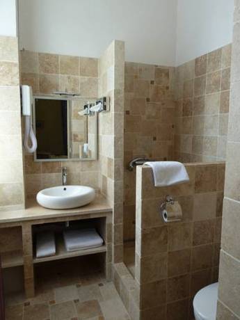 Imagen de la habitación del Hotel Le Castelet Des Alpilles. Foto 14