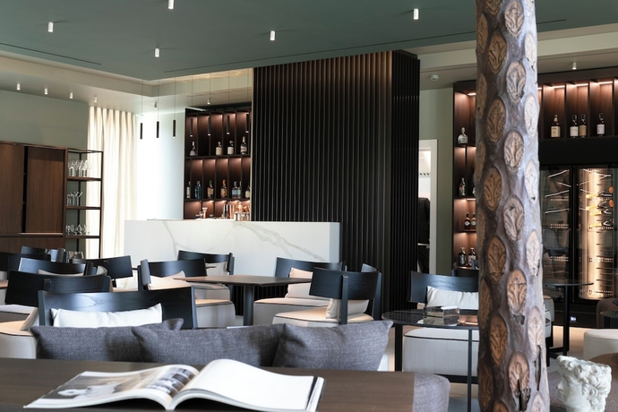 Imagen del bar/restaurante del Hotel Le Cattedrali Relais by Laqua Collection. Foto 2