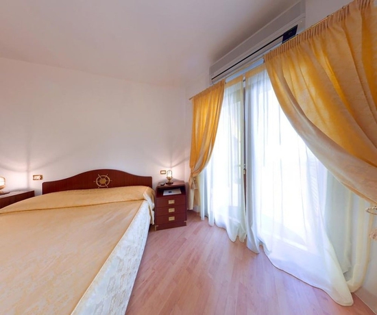 Imagen de la habitación del Hotel Le Cave. Foto 9