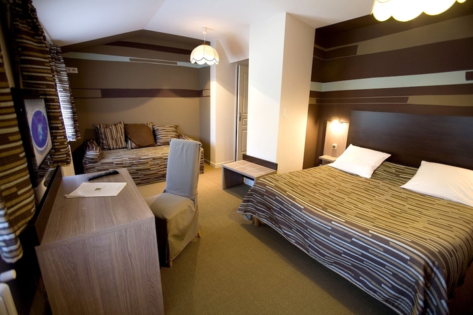 Imagen de la habitación del Hotel Le Central - Restaurant. Foto 11