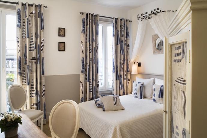 Imagen de la habitación del Hotel Le Central, Trouville-Sur-Mer. Foto 10